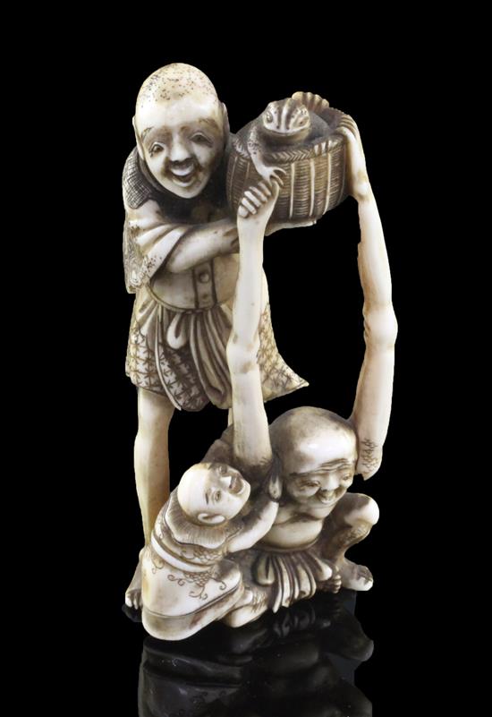 A Japanese ivory okimono of Ashinaga and Tenaga, Meiji period, 10.3cm